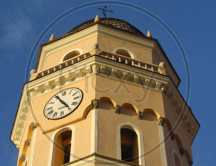 Clock tower with blue sky in background