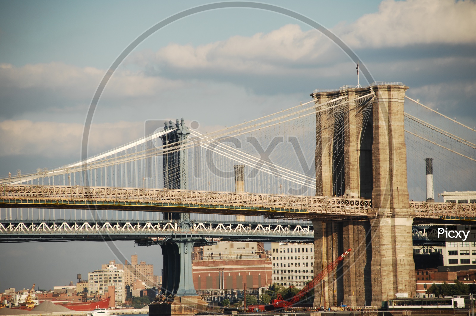 Beautiful view of Brooklyn Bridge with city in the background