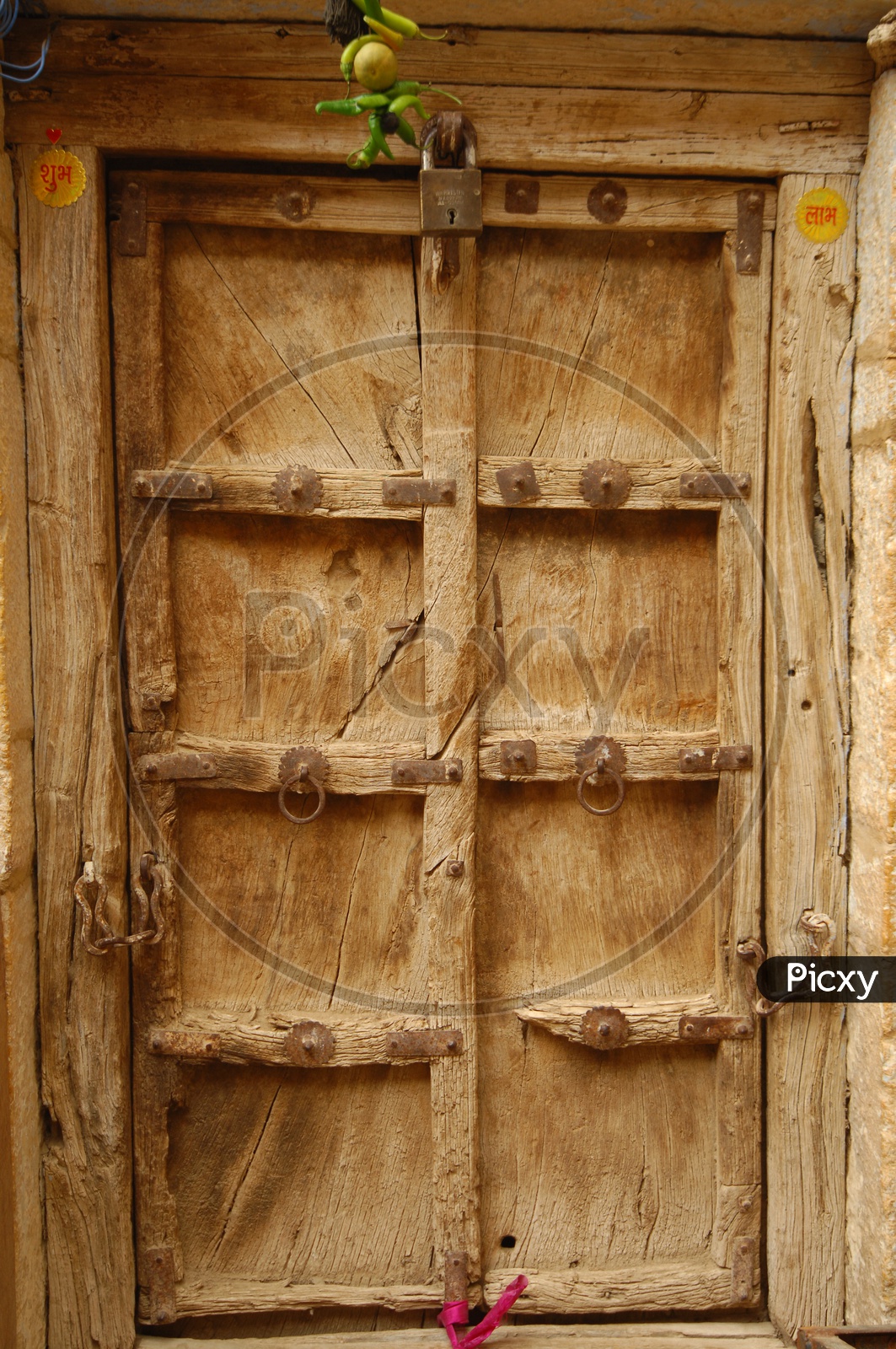 Old wooden arch door of an ancient Building