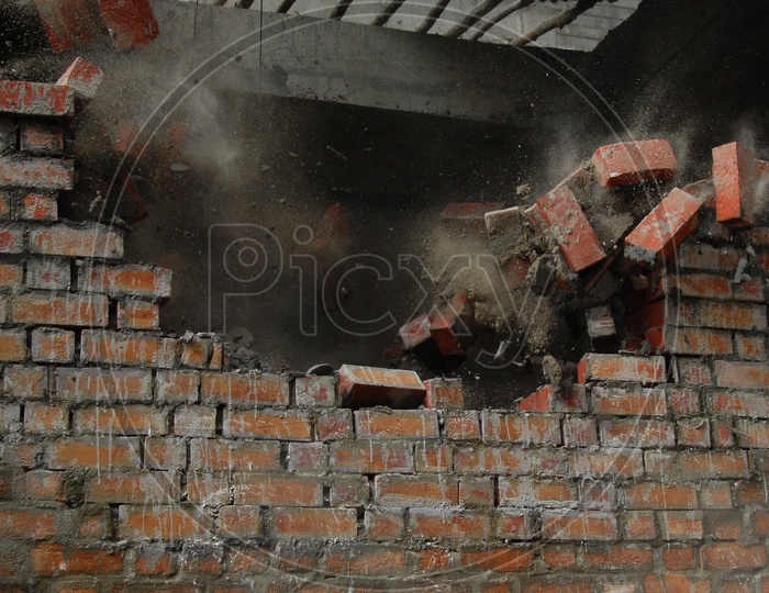 A wall with broken bricks