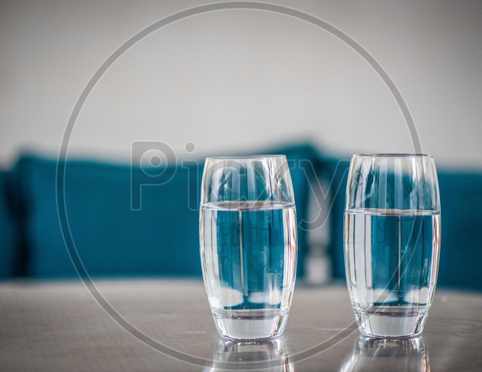 Glasses Filled With Water On a Table