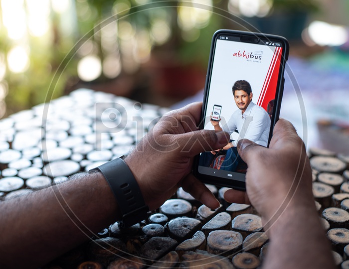 Indian Man Accessing Abhi Bus App In Smart Phone