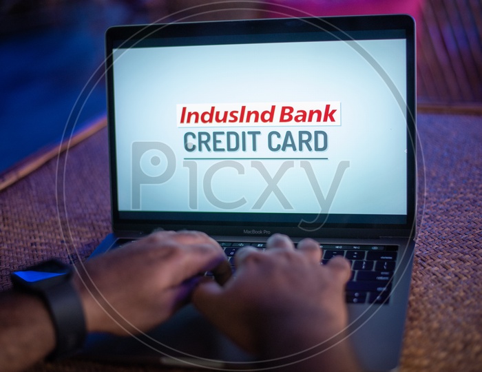 IndusInd Bank Credit Card on Laptop