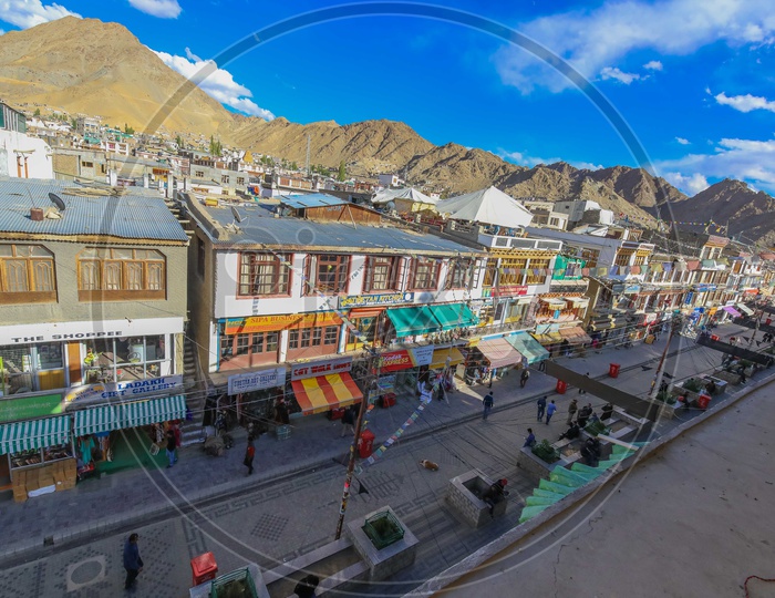 Streets of Leh alongside the mountains in background