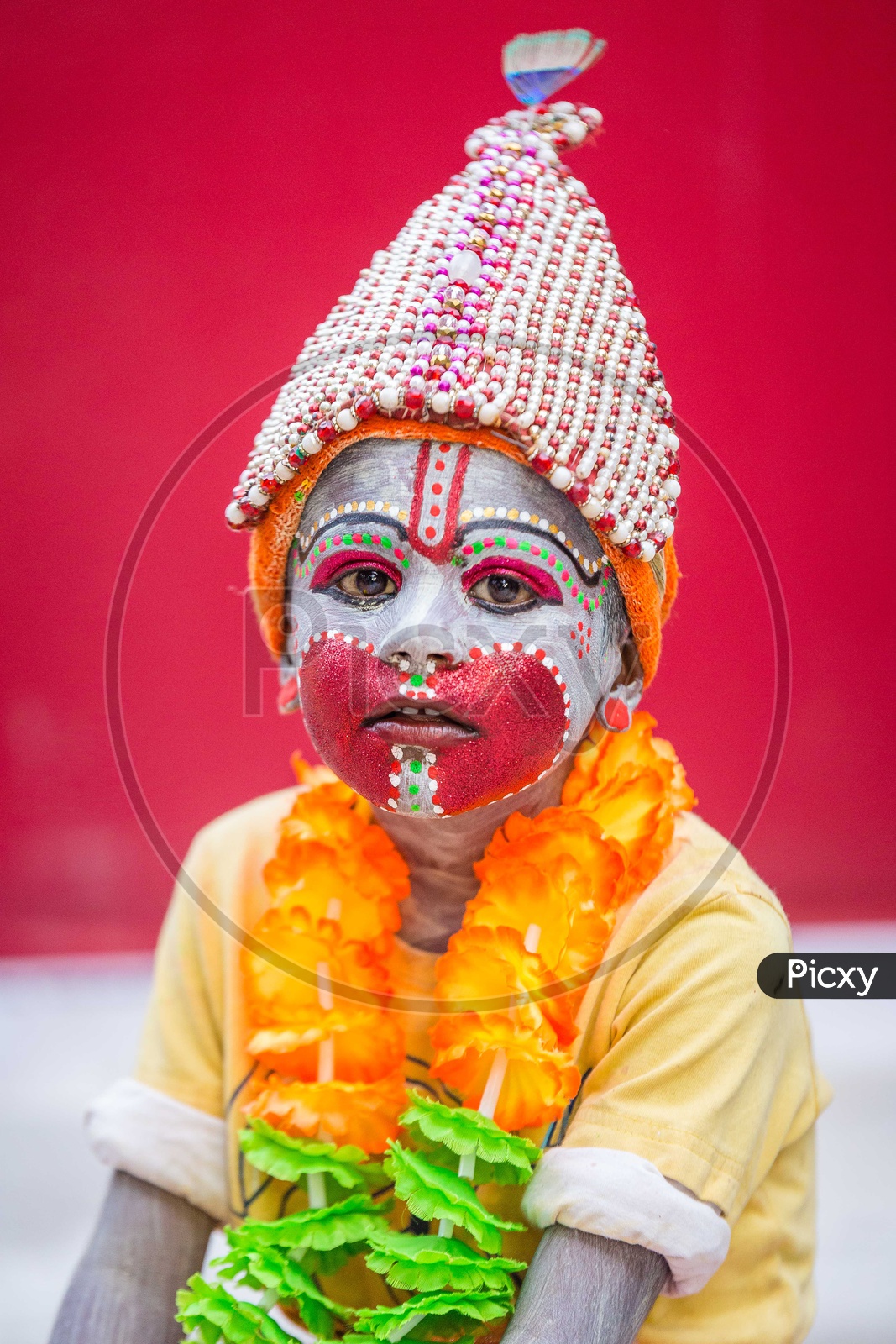 Portrait Of A Small Boy Dressed Up as  Hindu God Hanuman