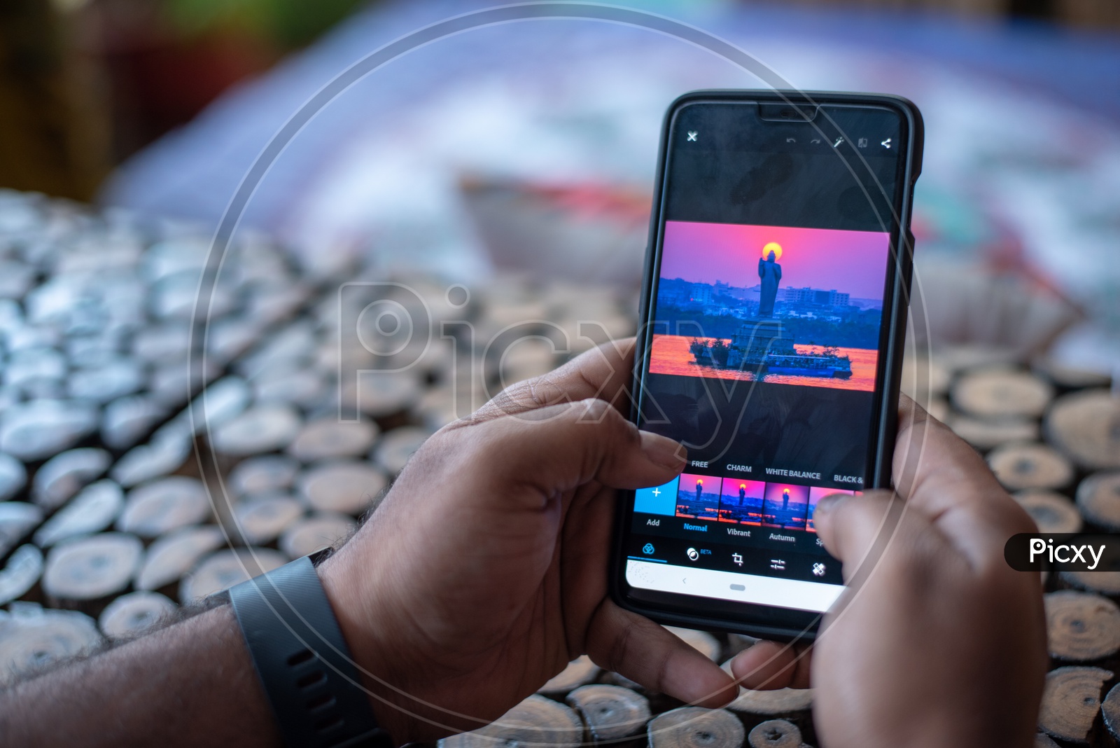 Indian Man Using Instagram in Smart Phone
