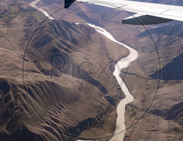 Aerial view of the Indus River flowing by the flood plains