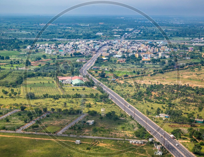 Aerial View Of High Way Road With Vehicles From Flight Window