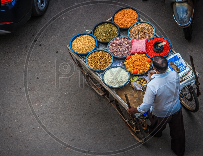 Aerial View Of A Street Vendor Selling Sprouts And Pulses in India