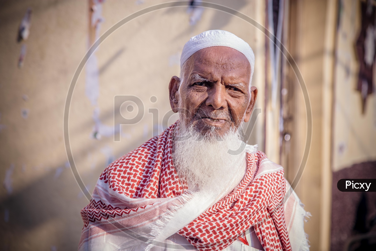 Portrait of an old muslim man with white beard