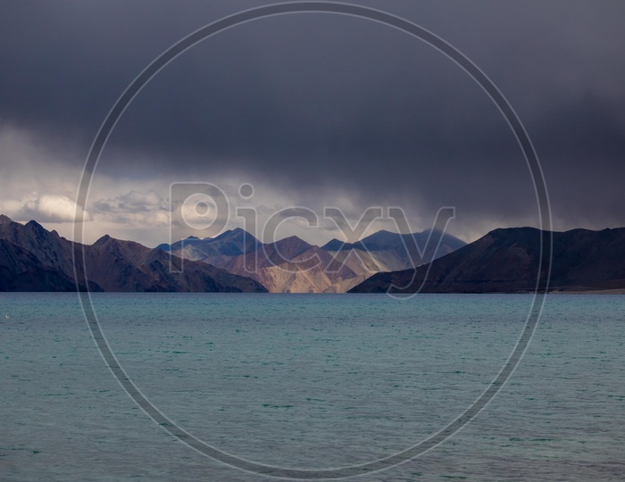 Landscape of Pangong Lake along with the snow capped mountains