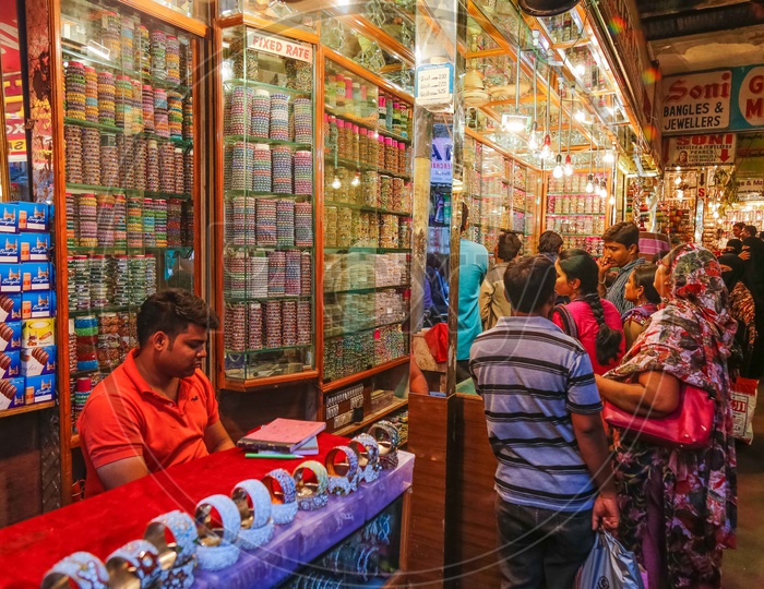 Bangles and ornament vendors at street bazaar
