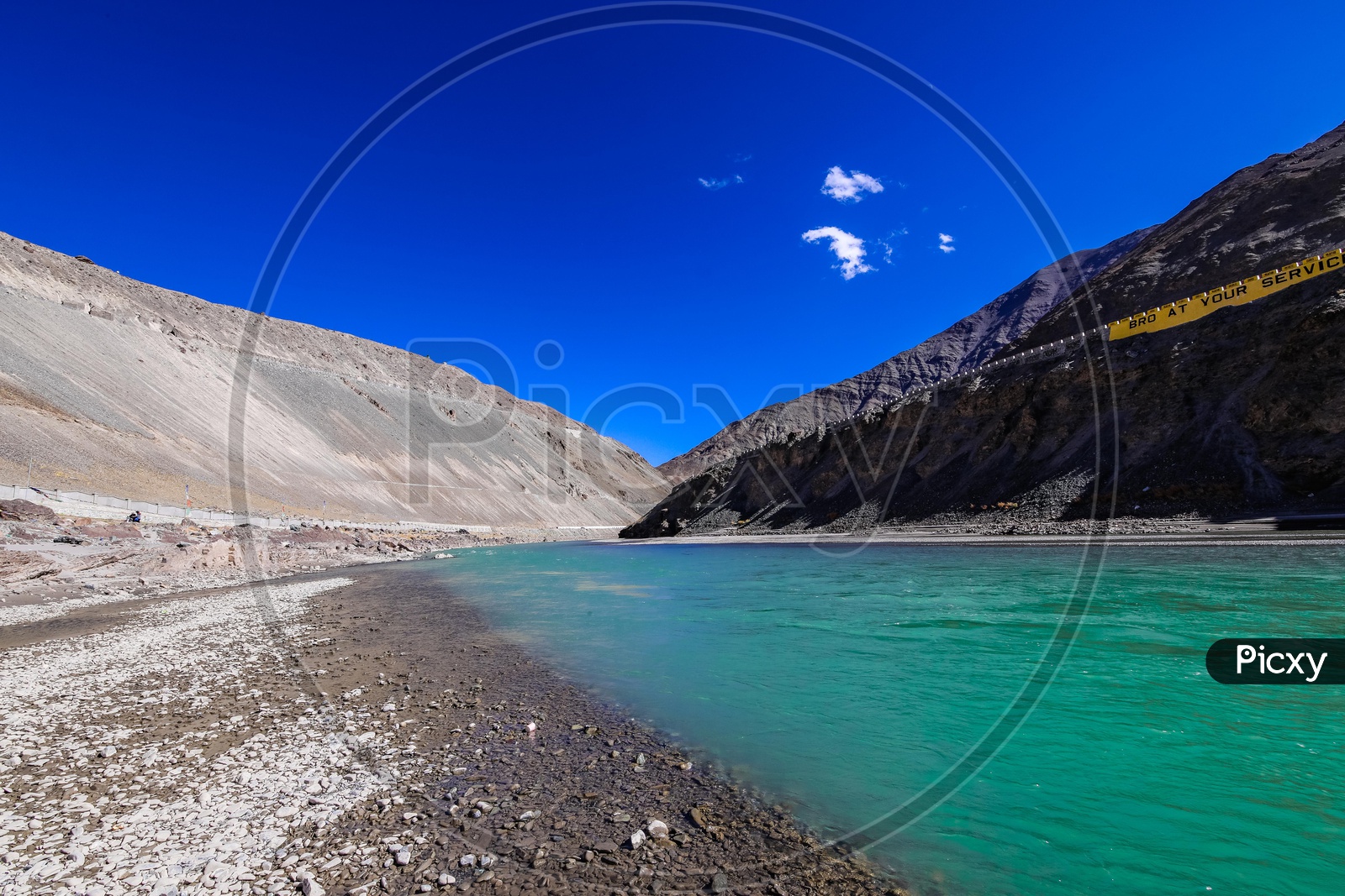 Indus River flowing by the mountains