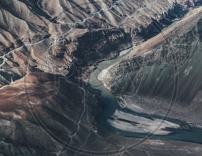 Aerial view of the Indus River flowing through the mountains