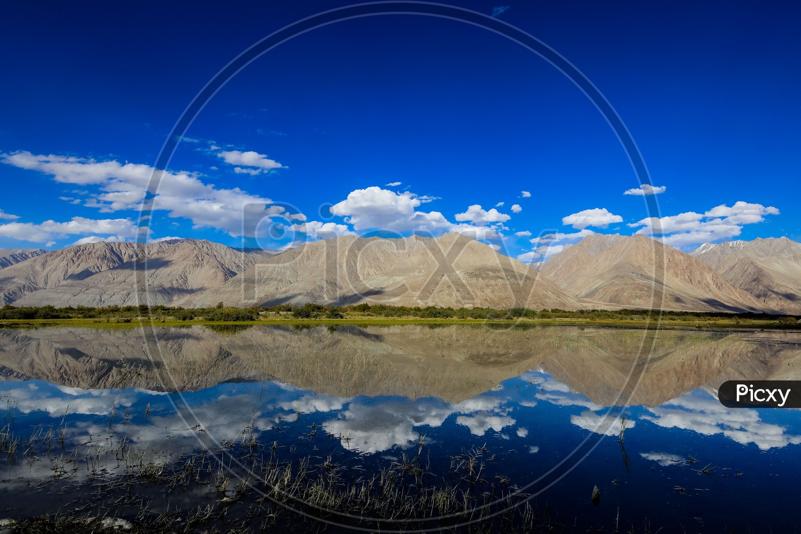 Reflection of landscape of mountains