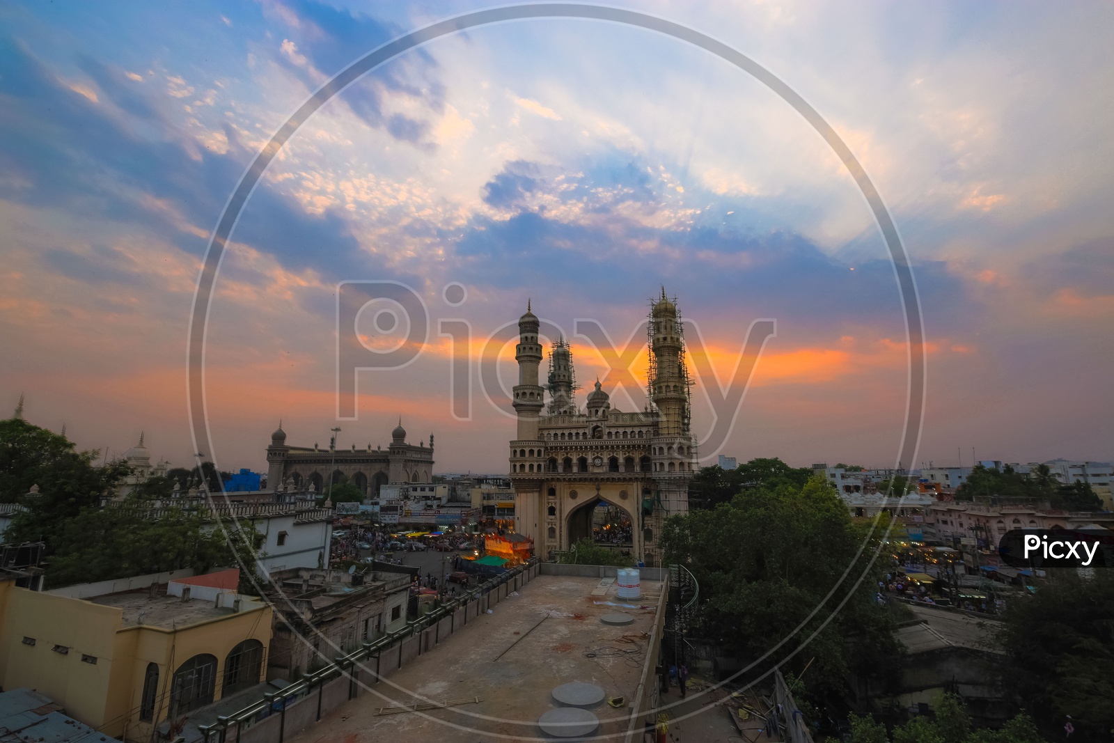 Landscape of Charminar and Mecca Masjid during a sunset