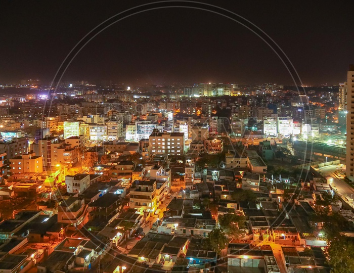Aerial View of City Scape With in Night Time With Luminous Light From Houses