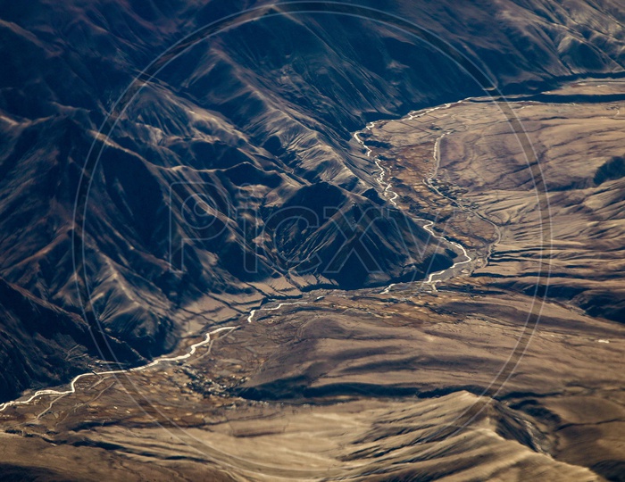 Aerial view of the Indus River flowing alongside the Flood Plains