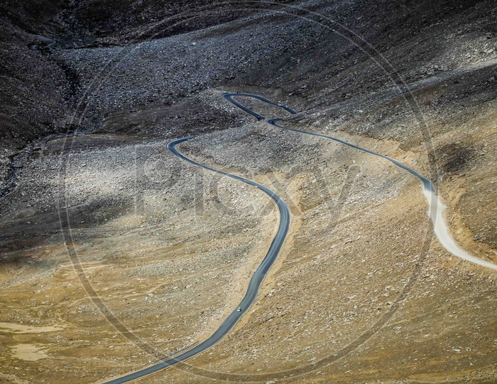 Aerial view of roadway through the hills