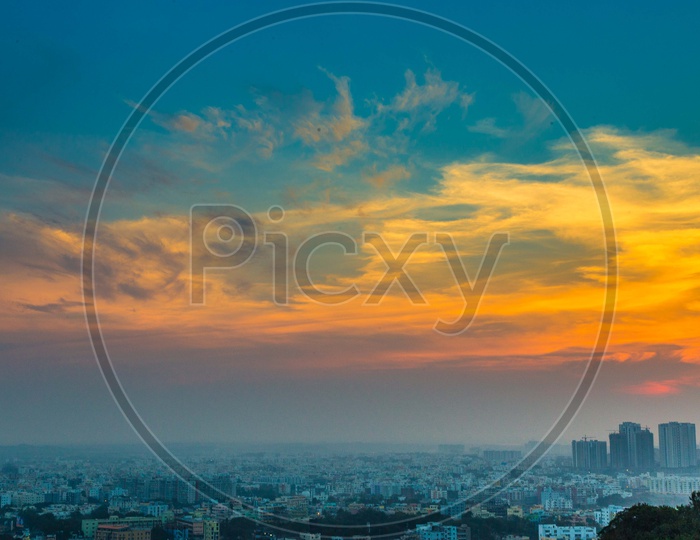 Hyderabad City Scape With High Rise Buildings On a Golden Hour Sky With Clouds