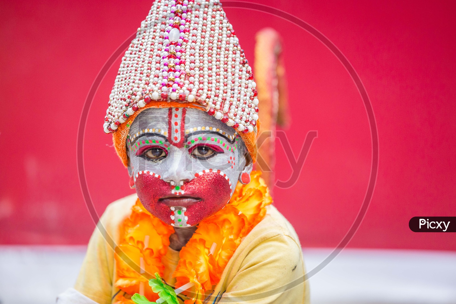 Portrait Of A Small Boy Dressed Up as  Hindu God Hanuman