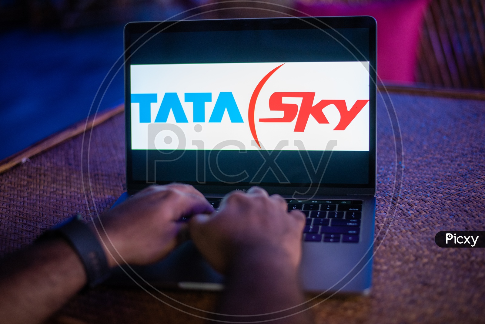 Indian Man Accessing TATA SKY Portal In Laptop