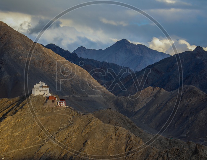 Landscape of a Buddhist Monastery alongside the mountains