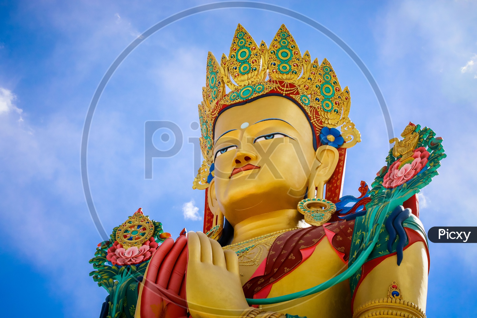 Face of the Giant Maitreya Statue with blue sky