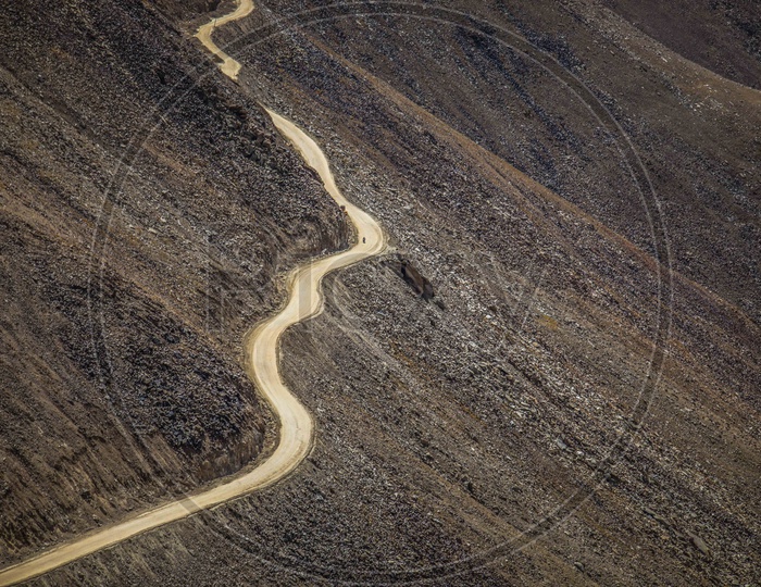 Aerial view of Roadway alongside the hills