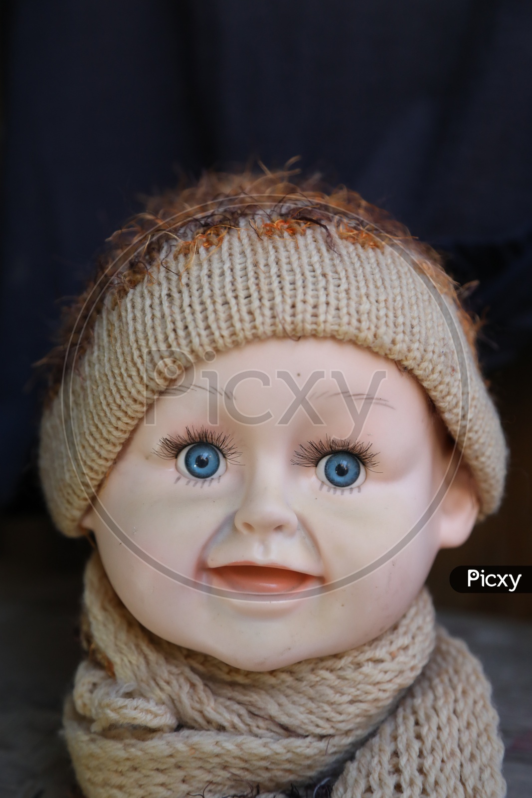 Blue eyes of a baby figurine
