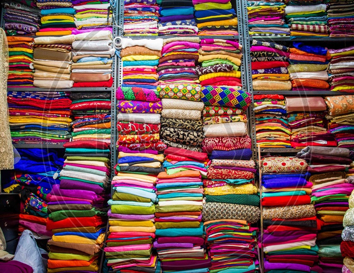 Sarees In a Store Arranged in Manner