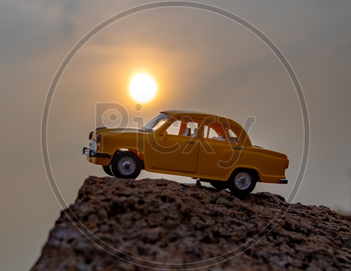 Ambassador Car Toy and Sunset in background