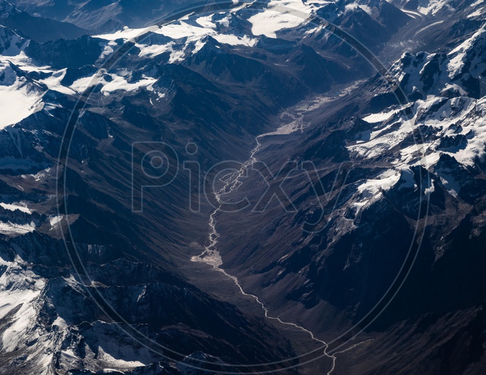 Snow-capped Mountains of leh in Aerial View captured from flight window
