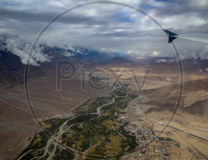 Snow-Capped mountains of leh captured from flight window