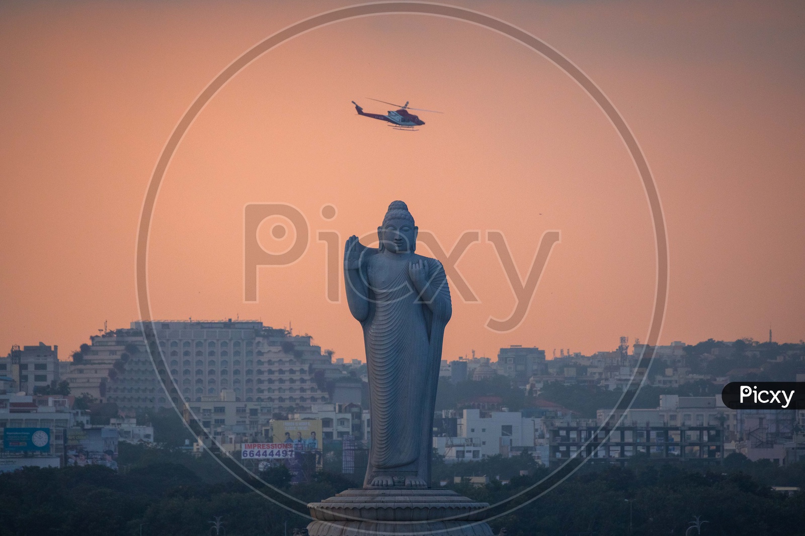 Buddha Statue in Hussain Sagar and Helicopter
