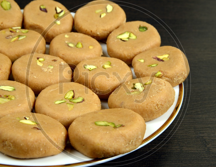 Indian sweet food, Pedha or Peda, arrange in a dish to serve