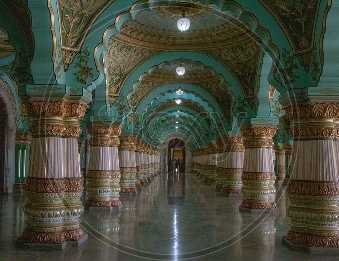 Architecture Of Mysore Palace With Designs On Pillars And Corridor