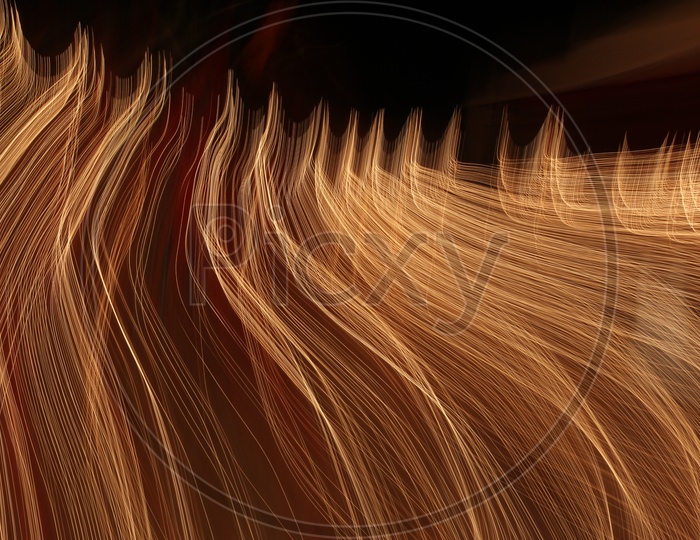 Abstract of blurred light trail pattern with black background