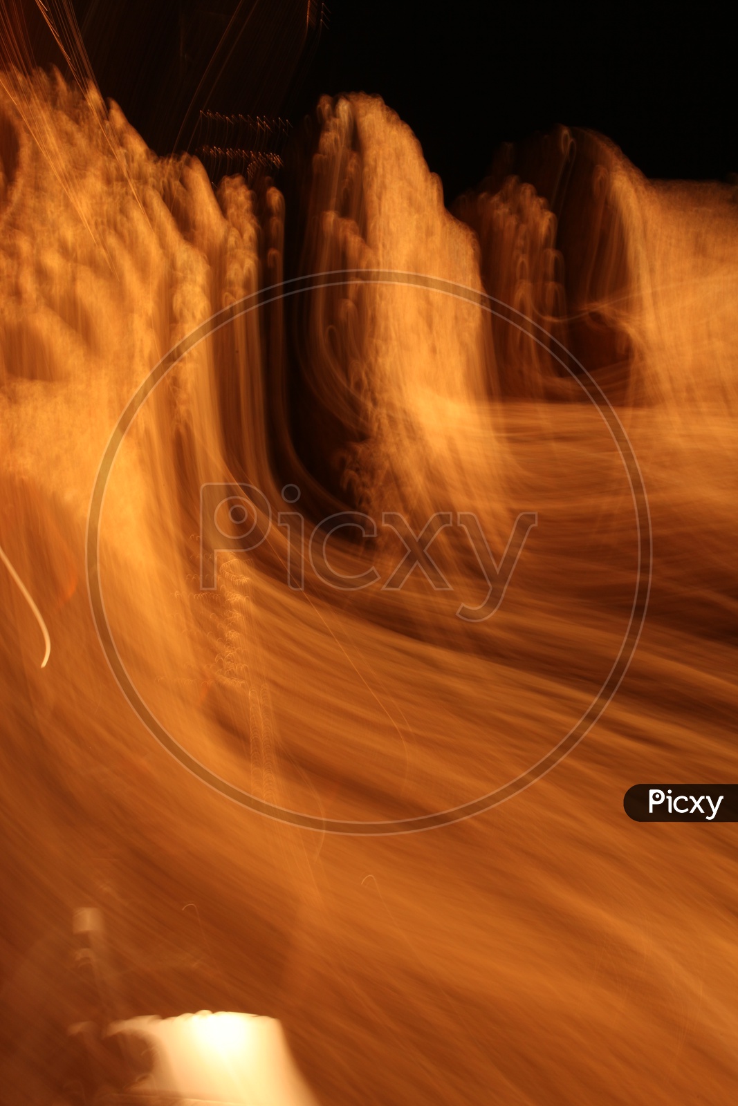 Abstract of blurred soft light trail pattern with black background