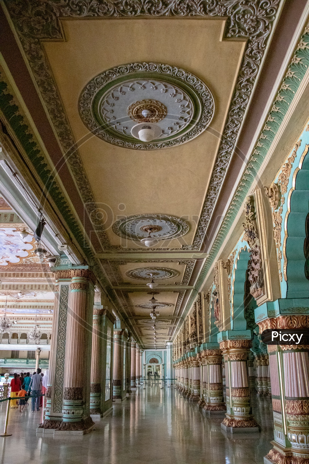 Architecture Of Mysore Palace With Designs On Pillars And Corridor