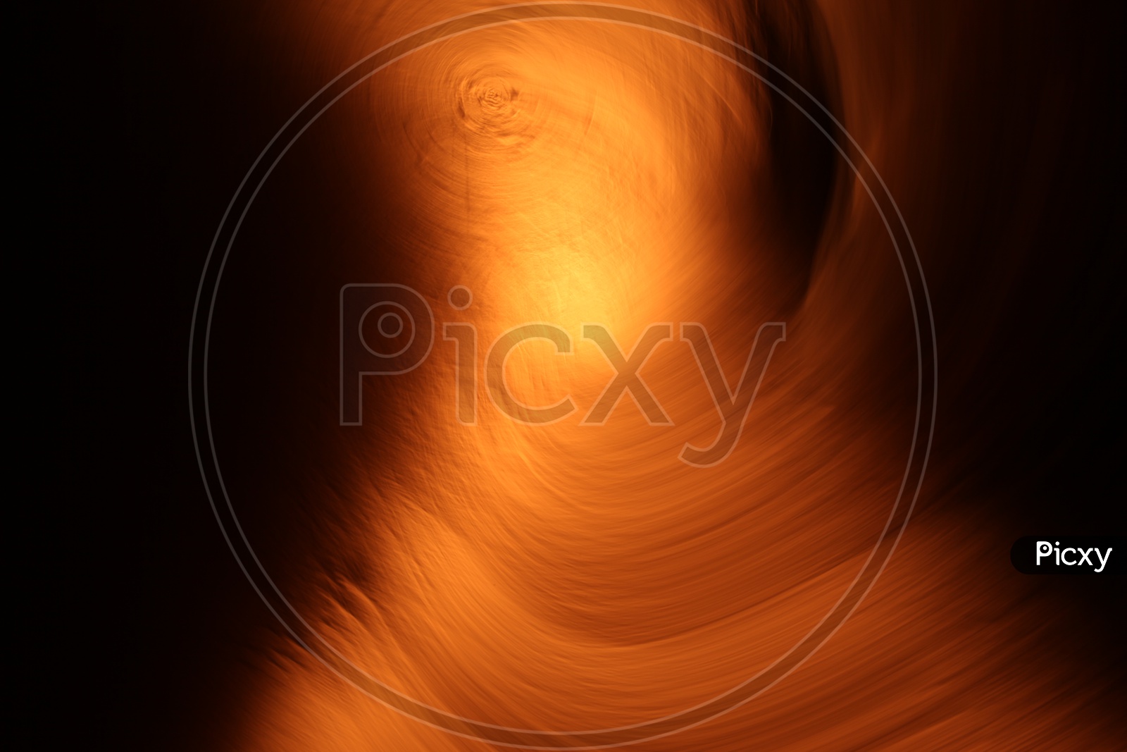 Abstract soft blurred light trail pattern with black background