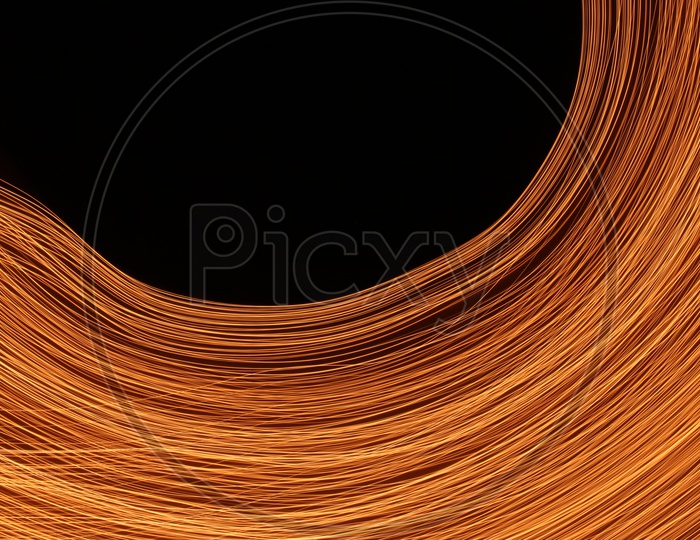 Abstract light trail pattern with black background