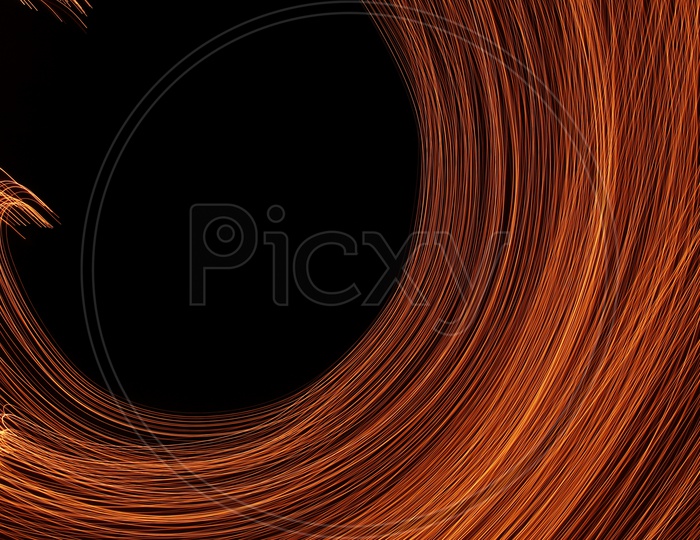 Abstract blurred light trail semicircle pattern with black background
