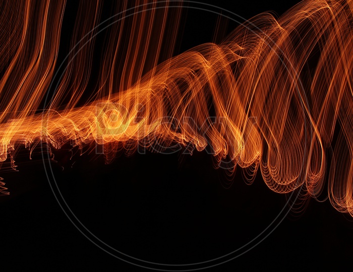 Abstract light trail in wavy pattern with black background
