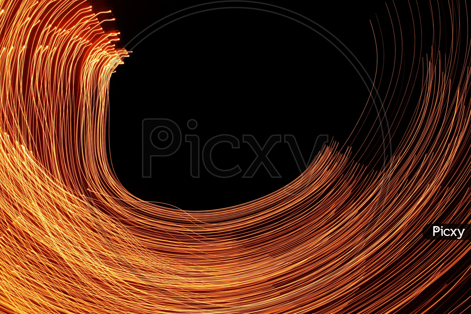 Abstract light trail forming semi circle pattern with black background