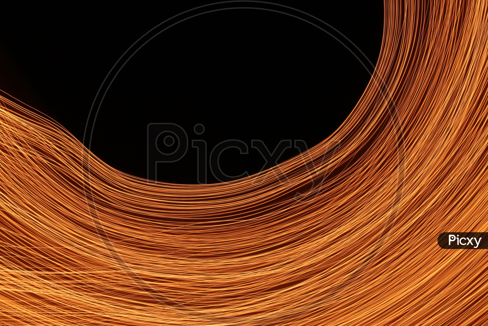 Abstract light trail pattern with black background