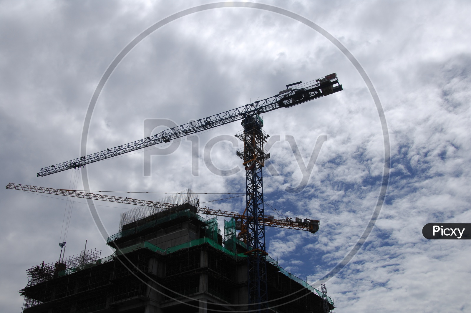 Tower crane alongside the construction of a High Rise building