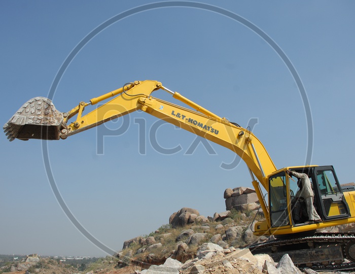 Bulldozer operator operating the bulldozer at a construction site