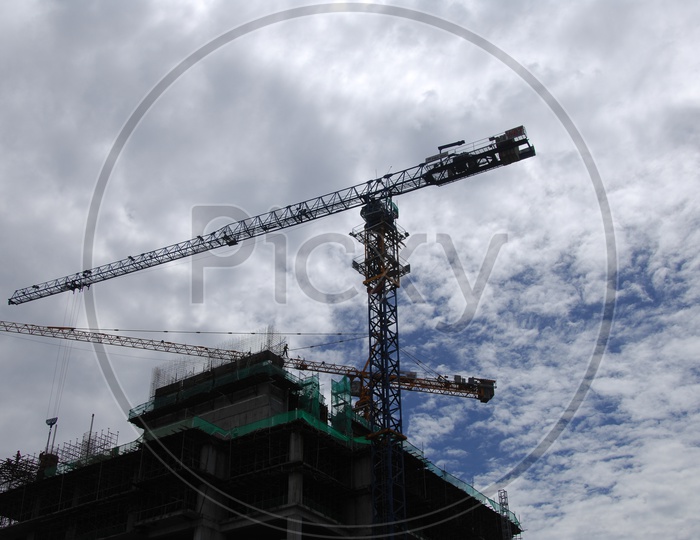 Tower crane alongside the construction of a High Rise building