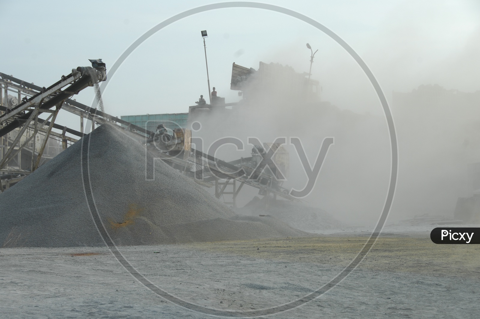 Basalt powder dust alongside the grinder machinery